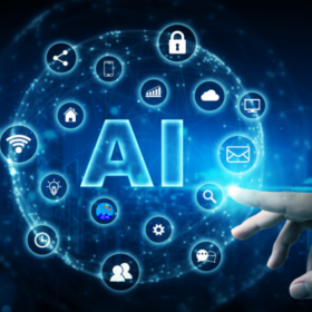 L’immagine comunica in modo immediato il tema dell’Intelligenza Artificiale come elemento centrale della trasformazione digitale della scuola. Il grande “AI” e la rete di icone luminose evocano innovazione, connessione e uso consapevole delle tecnologie, mentre la mano che interagisce con la struttura digitale suggerisce il ruolo attivo della scuola nel guidare e governare questi strumenti.